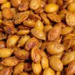 crispy cinnamon sugar roasted pumpkin seeds - featured image